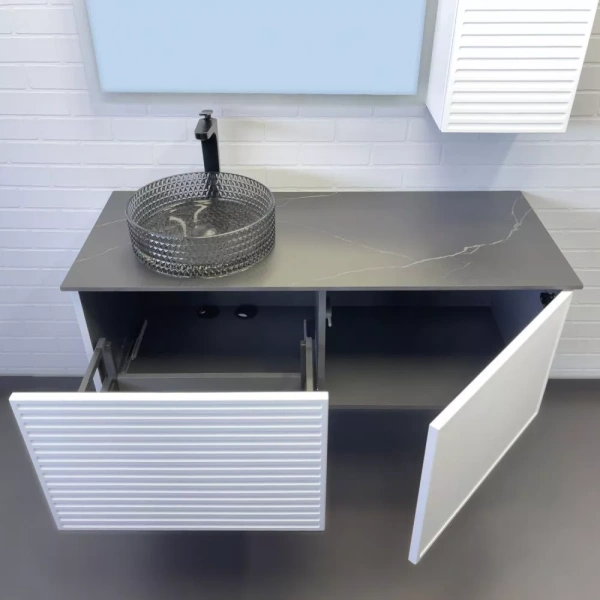 Тумба с раковиной Comforty Геленджик-120 120х52,5х50 см со столешницей мрамор Калакатта Блэк, подвесная, 1 распашная дверца/1 выдвижной ящик, ЛДСП/МДФ, прямоугольная, цвет белый матовый/раковина Comforty CF21004, круглая, из стекла, накладная