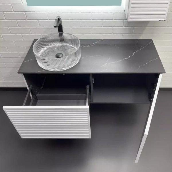 Тумба с раковиной Comforty Геленджик-120 120х52,5х50 см со столешницей мрамор Калакатта Блэк, подвесная, 1 распашная дверца/1 выдвижной ящик, ЛДСП/МДФ, прямоугольная, цвет белый матовый/раковина Comforty CF21001, круглая, из стекла, накладная